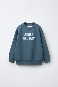 FLOCKED TEXT SWEATSHIRT