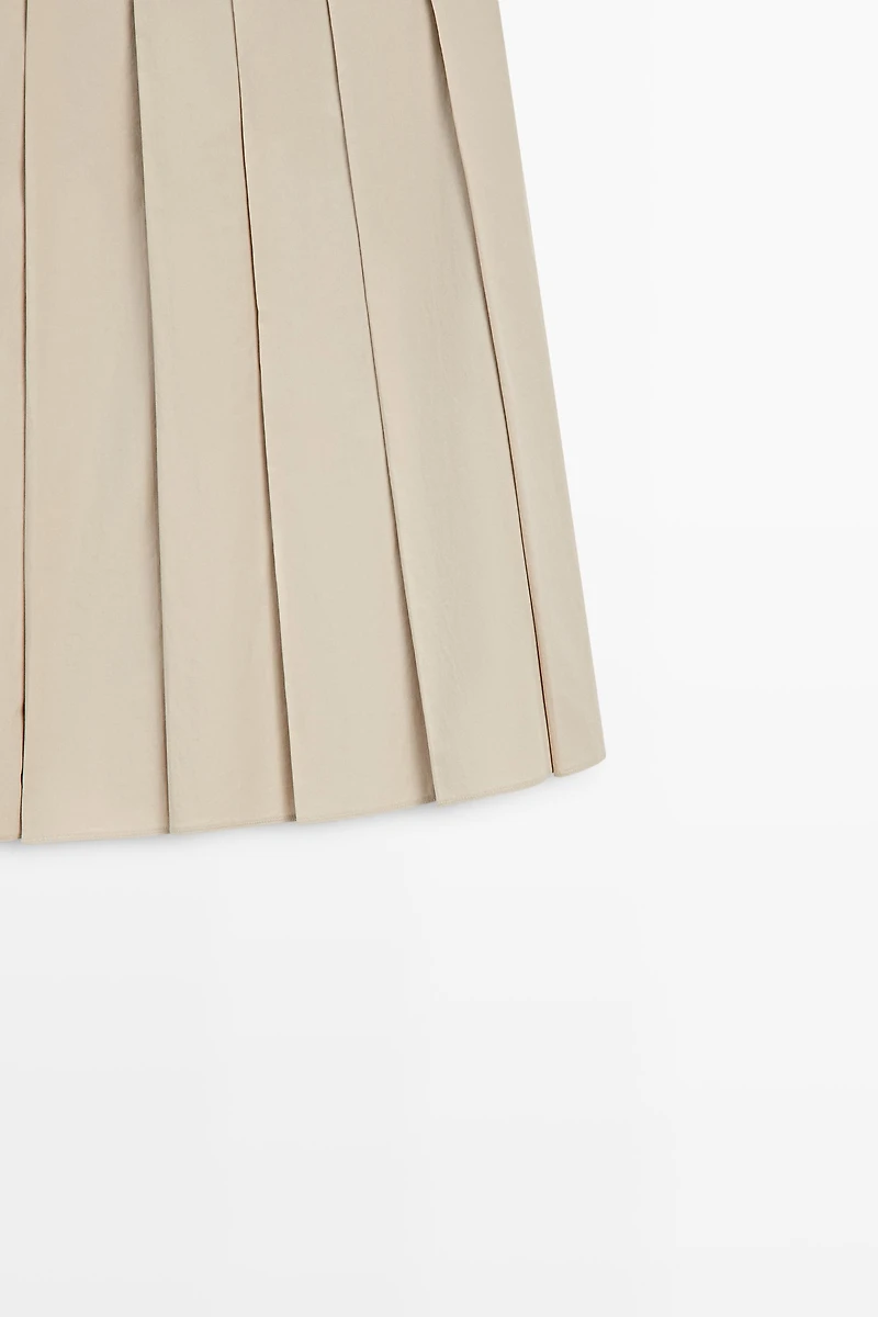 Pleated midi skirt with contrasting sash
