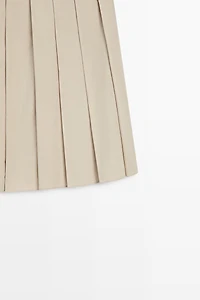 Pleated midi skirt with contrasting sash