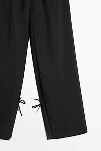 Double-layer pants with tie detail