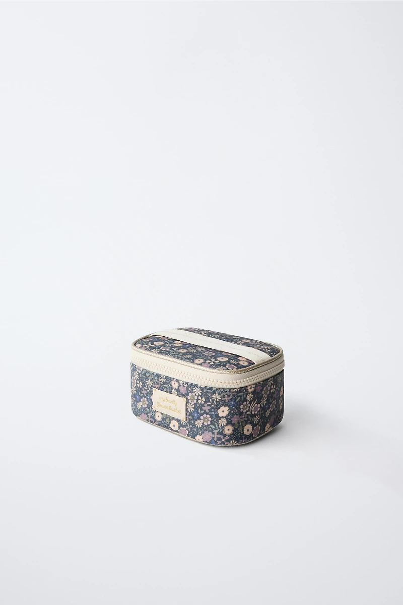 TROUSSE DE TOILETTE À FLEURS