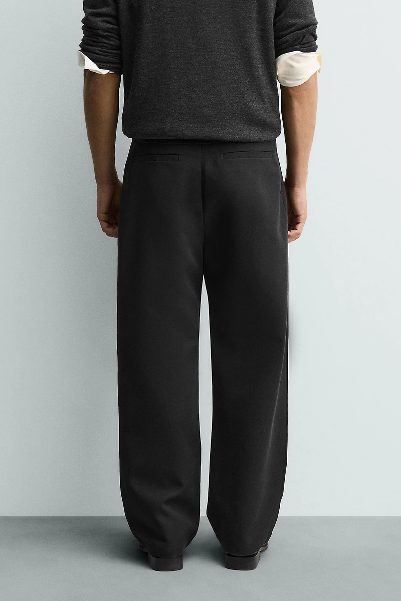 PLEATED WIDE FIT PANTS