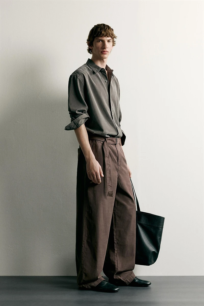 RELAXED FIT BELTED PLEATED PANTS
