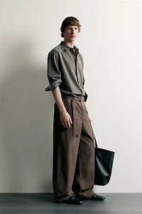 RELAXED FIT BELTED PLEATED PANTS