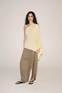 ASYMMETRIC CAPE