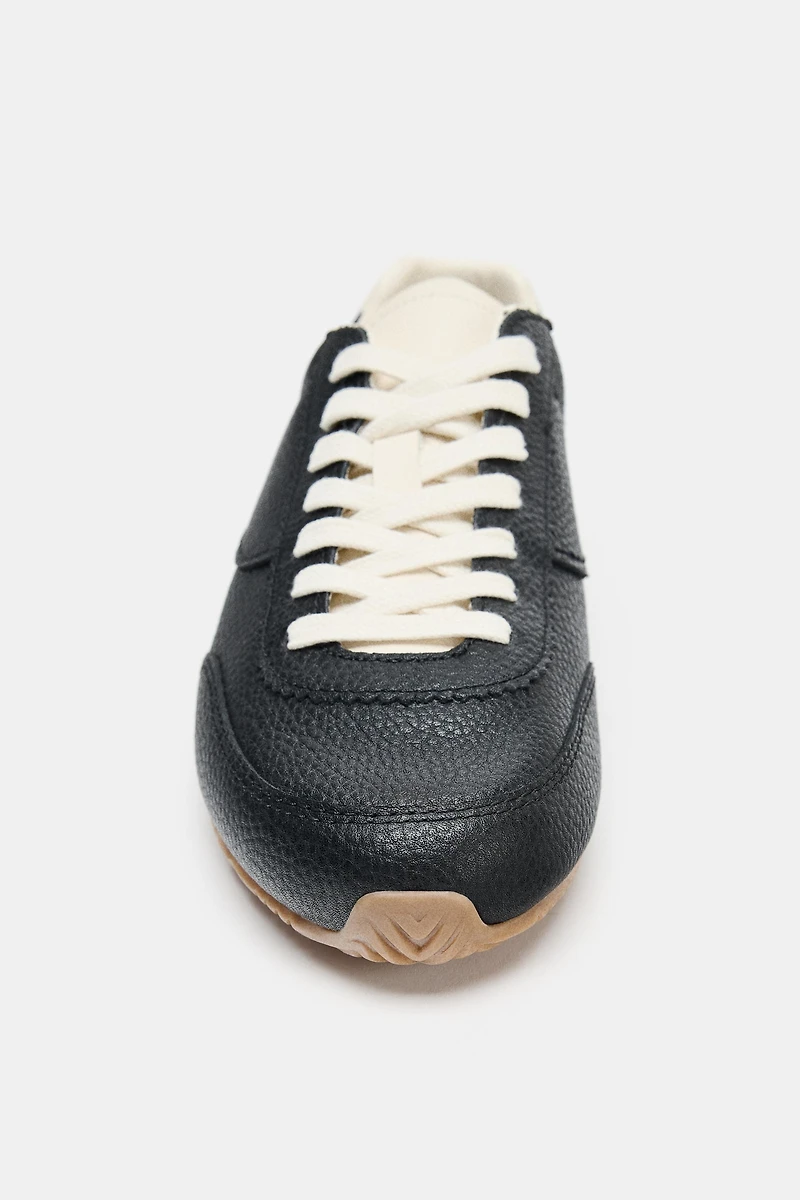 TENNIS EN CUIR CONTRASTE