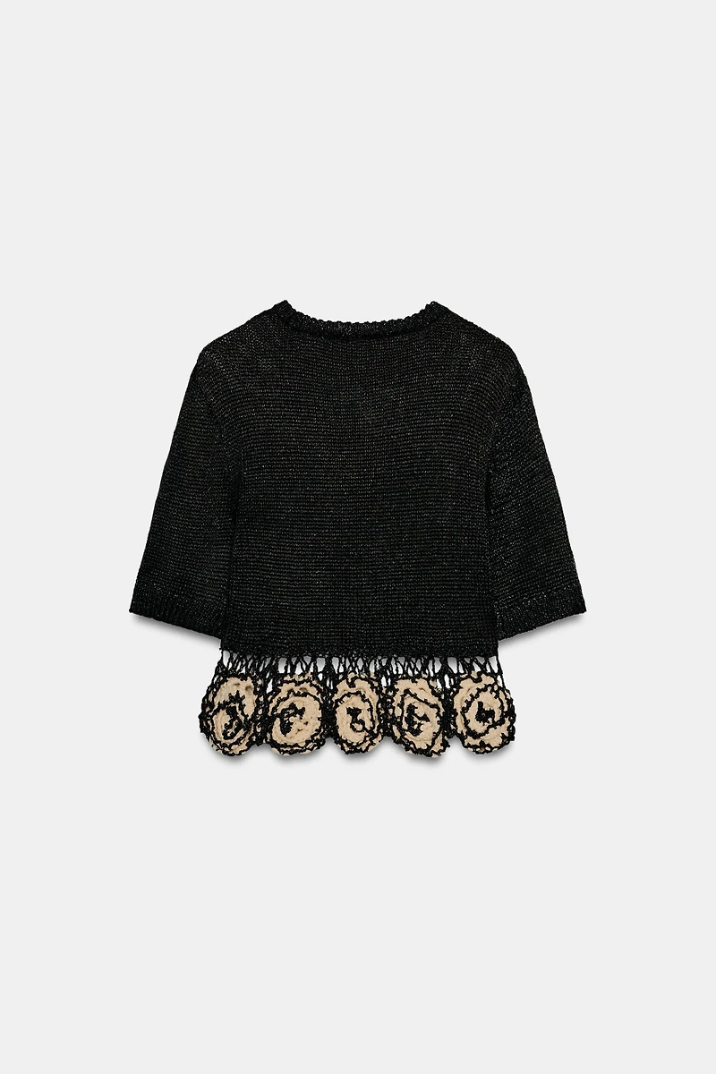 TOP EN MAILLE STRUCTURÉE À FLEURS