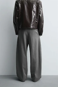 PANTALON BALLON AVEC PLIS ET CEINTURE