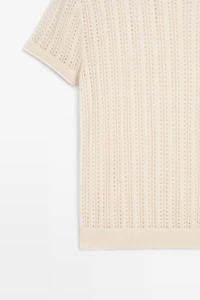 Short sleeve cutwork knit top