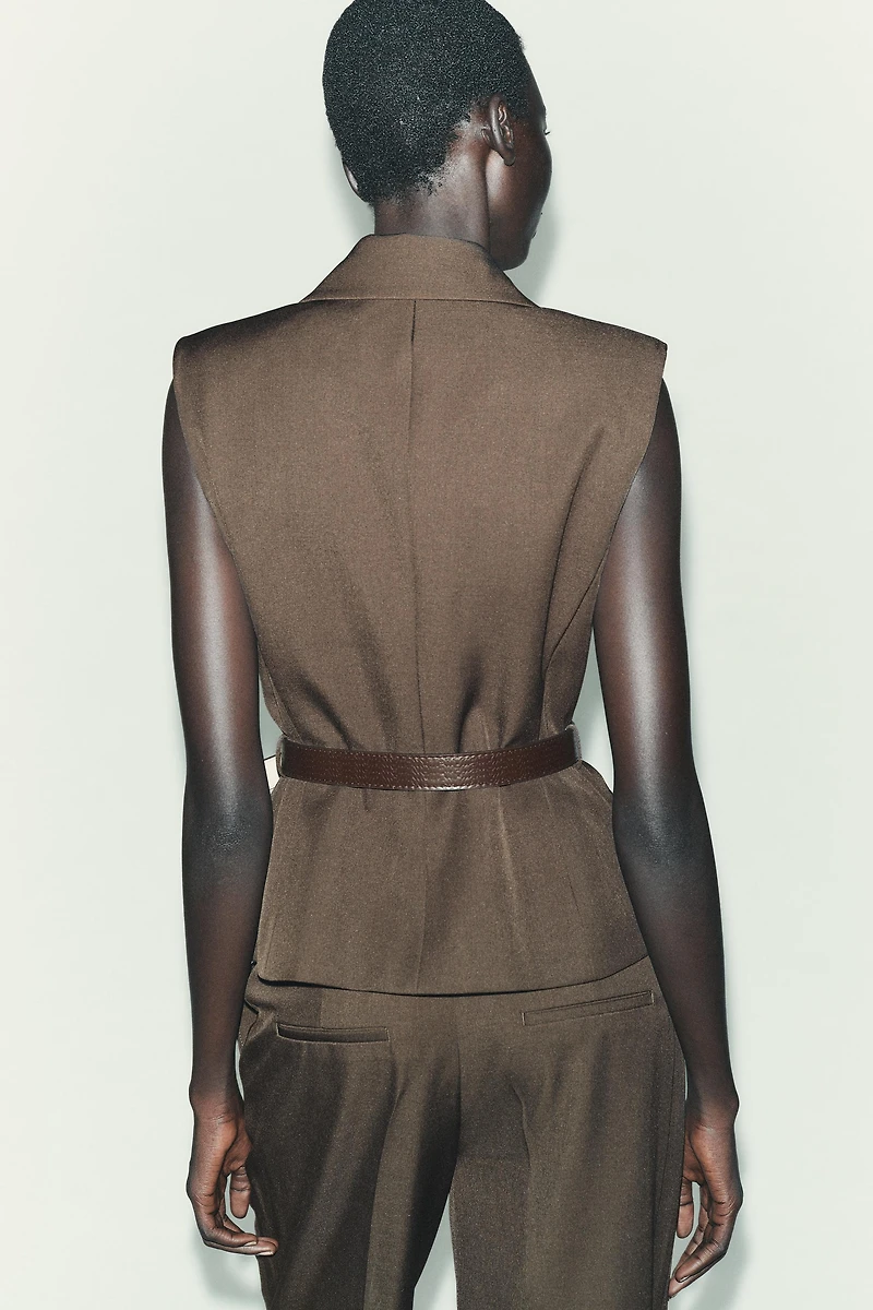 BELTED VEST