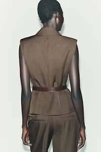 BELTED VEST