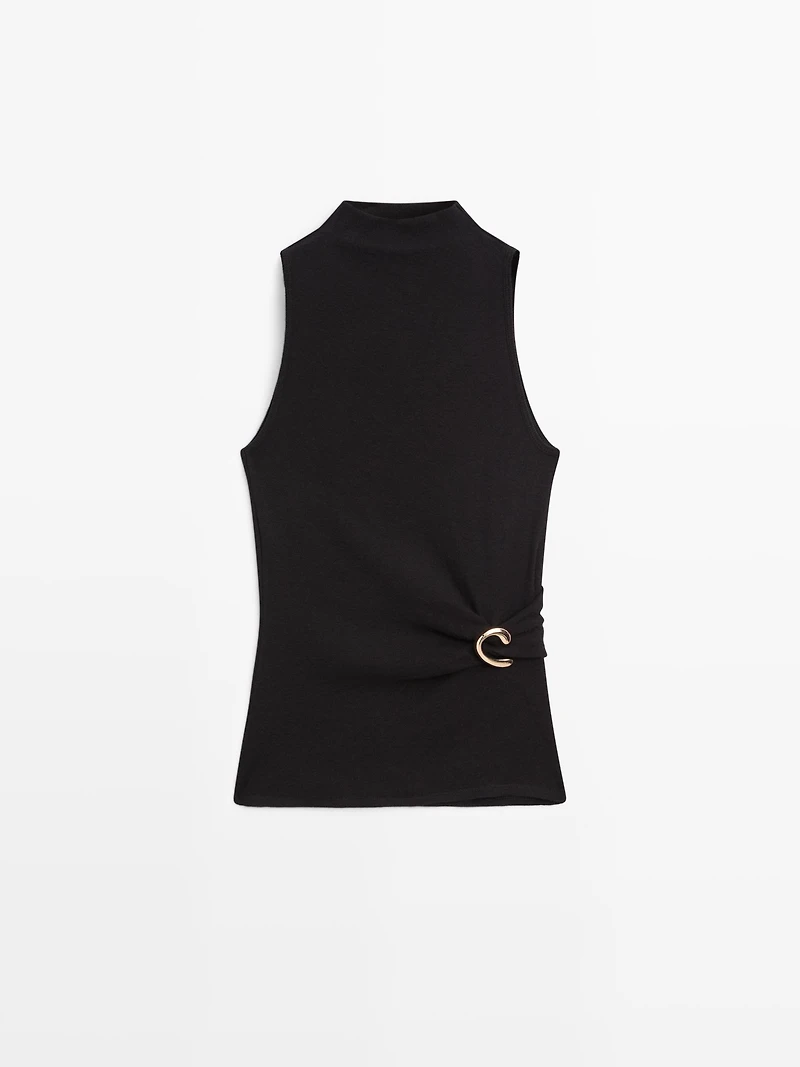 Funnel neck top with brooch detail