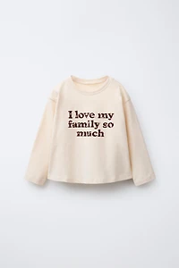 T-SHIRT AVEC INSCRIPTION FLOQUÉE