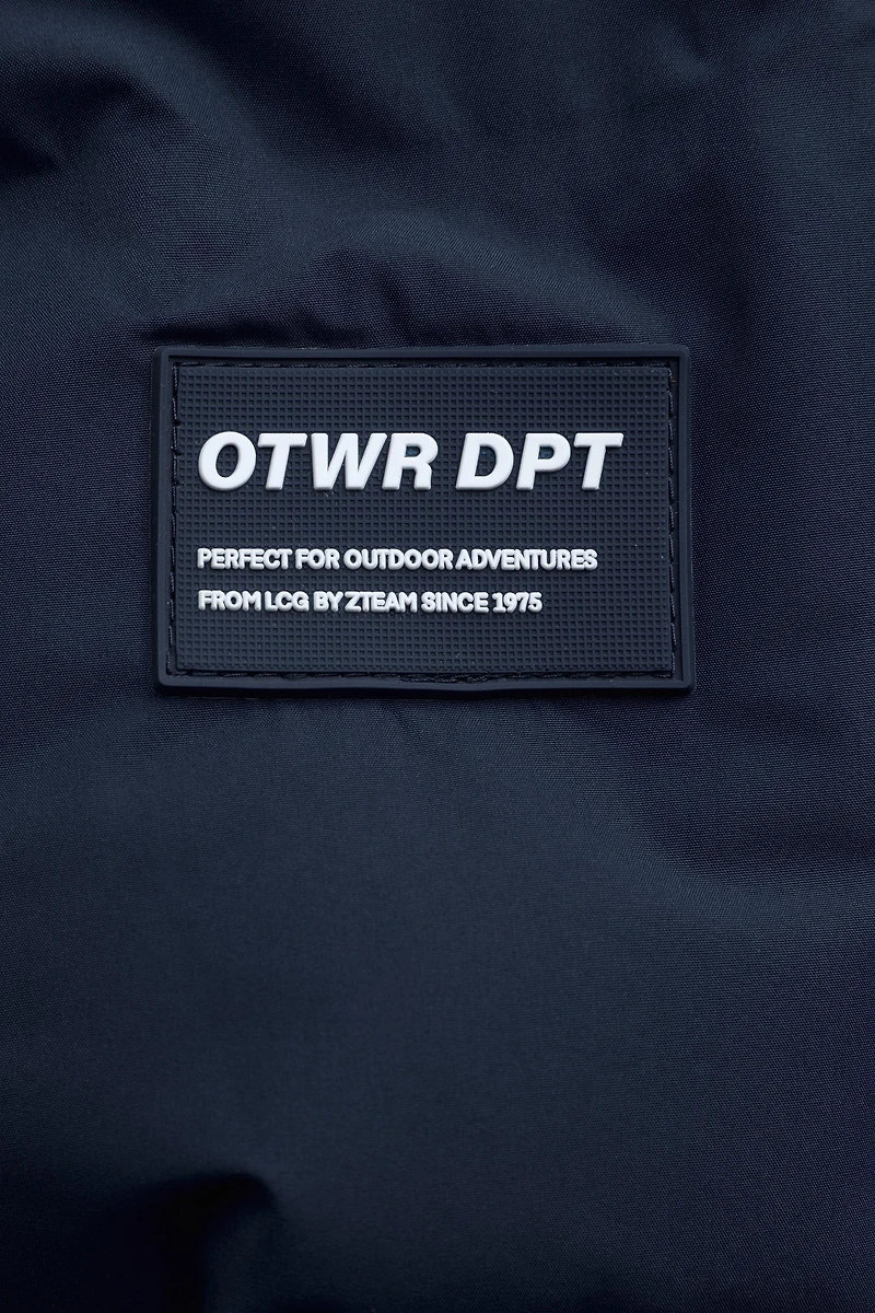 MANTEAU REMBOURRÉ ÉTIQUETTE DÉPERLANT