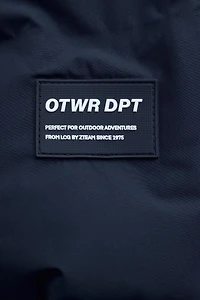 MANTEAU REMBOURRÉ ÉTIQUETTE DÉPERLANT