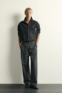 STRIPED COTTON-LINEN DENIM PANTS