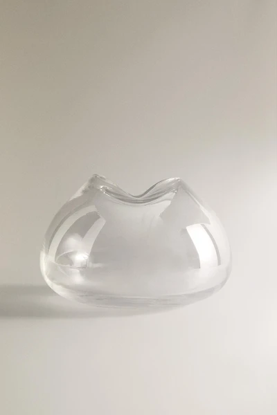 VASE WITH AN IRREGULAR LOW NECK