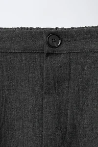 TEXTURED PLEATED PANTS