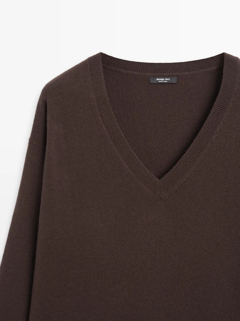 Long knit sweater with contrast lace