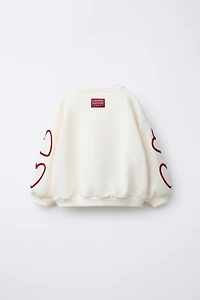 TEXT HEARTS SWEATSHIRT