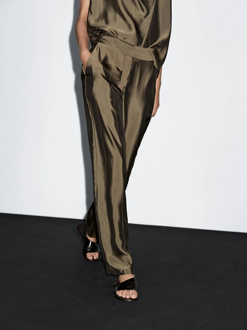 Flowing trousers with striped details
