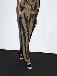 Flowing trousers with striped details