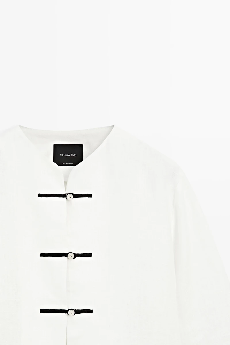100% linen flowing shirt with button detail