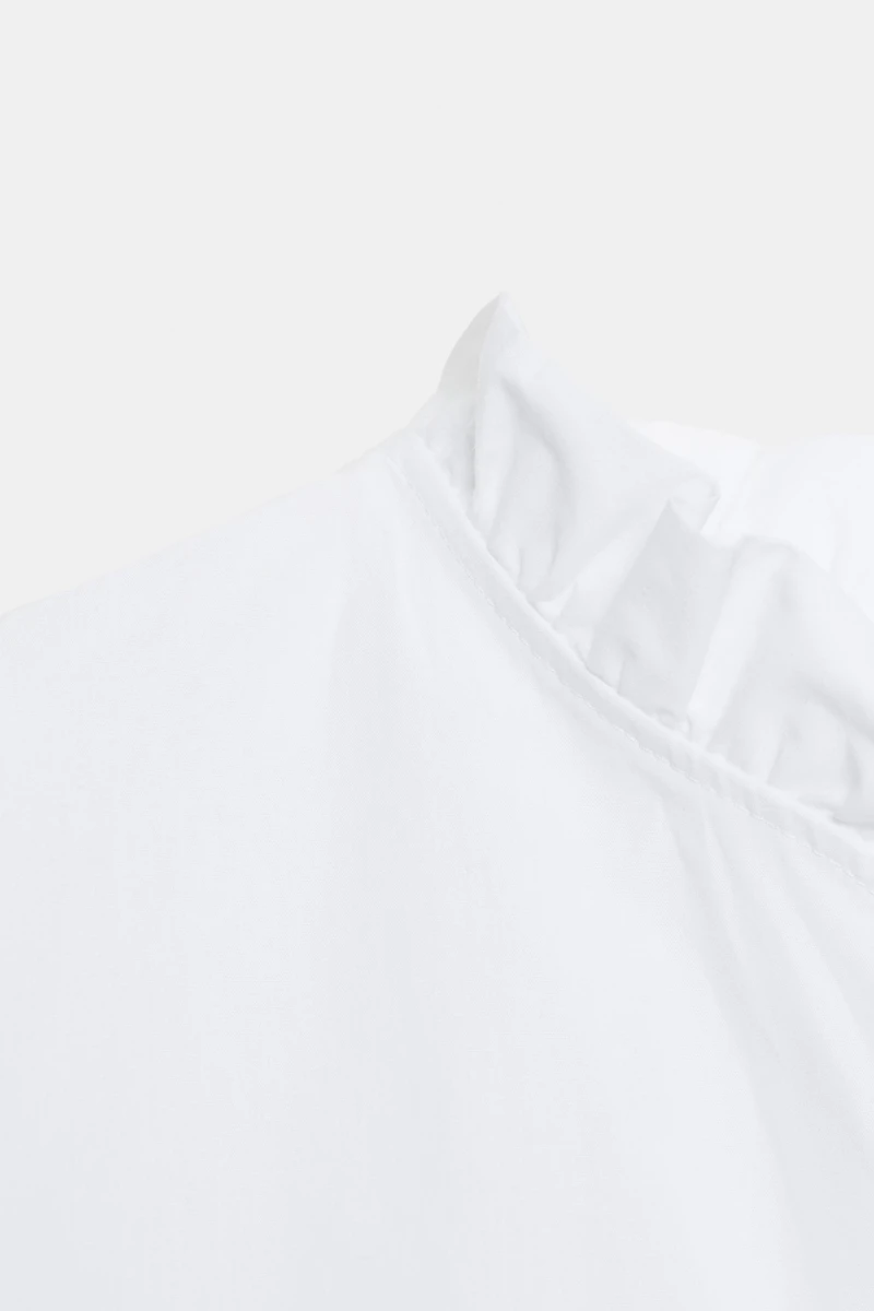 BLOUSE EN POPELINE À VOLANTS