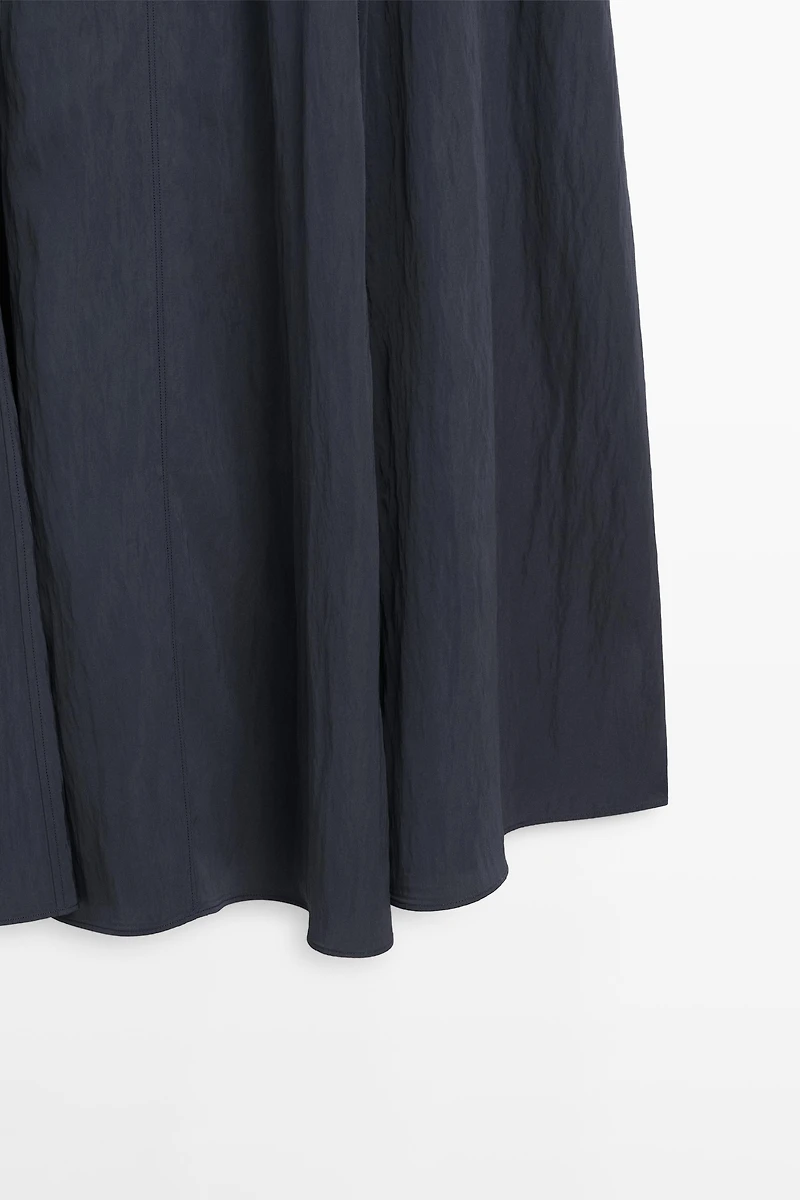 Robe midi fluide avec détails boucles
