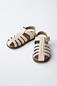 STUDDED FISHERMAN SANDALS
