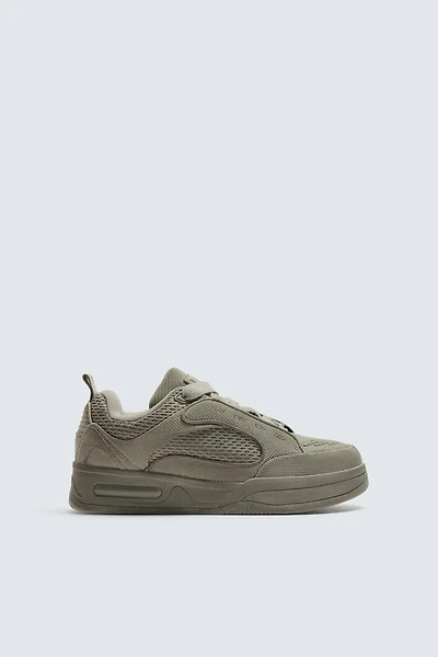 DISTRESSED THICK-SOLED SNEAKERS
