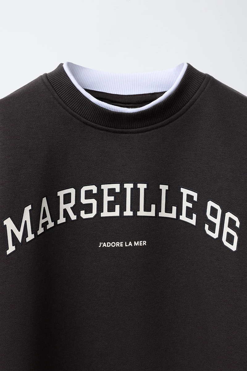 ENSEMBLE SWEAT-SHIRT ET LEGGING FLARE À INSCRIPTION