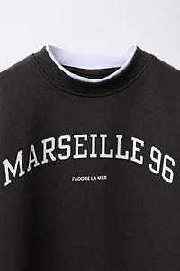 ENSEMBLE SWEAT-SHIRT ET LEGGING FLARE À INSCRIPTION