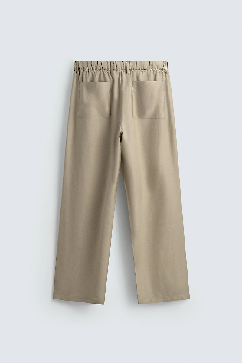 FLOWY PLEATED PANTS