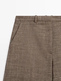 Wide-leg voluminous wool blend trousers