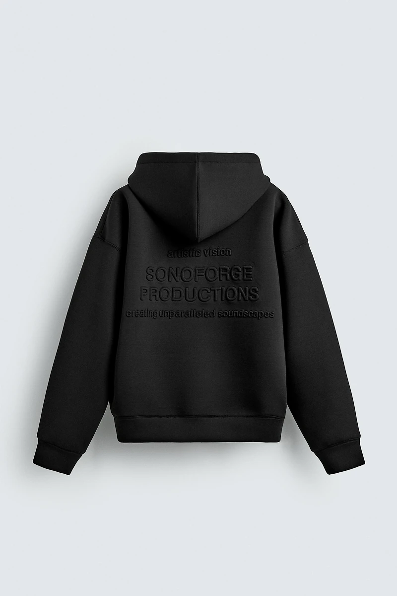 RAISED TEXT NEOPRENE EFFECT SWEATSHIRT