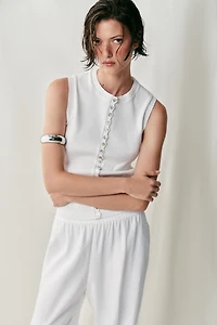 TOP À BOUTONS