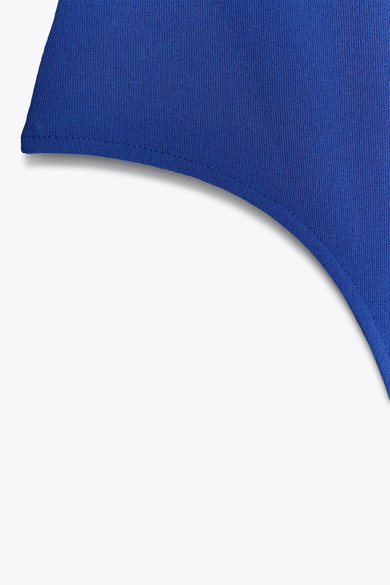 BODY CAPE ASYMÉTRIQUE