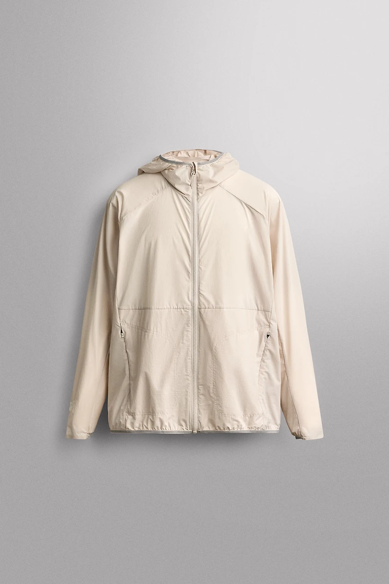 TECHNICAL WINDBREAKER JACKET