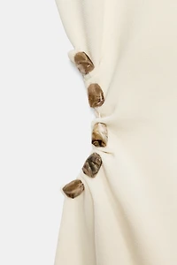 KNIT CUT OUT DRESS WITH BALLS