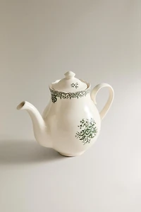 THÉIÈRE EN FAÏENCE À MOTIF FLORAL