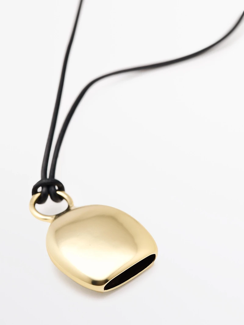 Pendentif pièce dorée