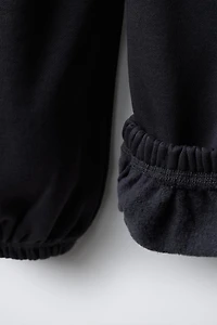 BALLOON PLUSH PANTS WITH TEXT