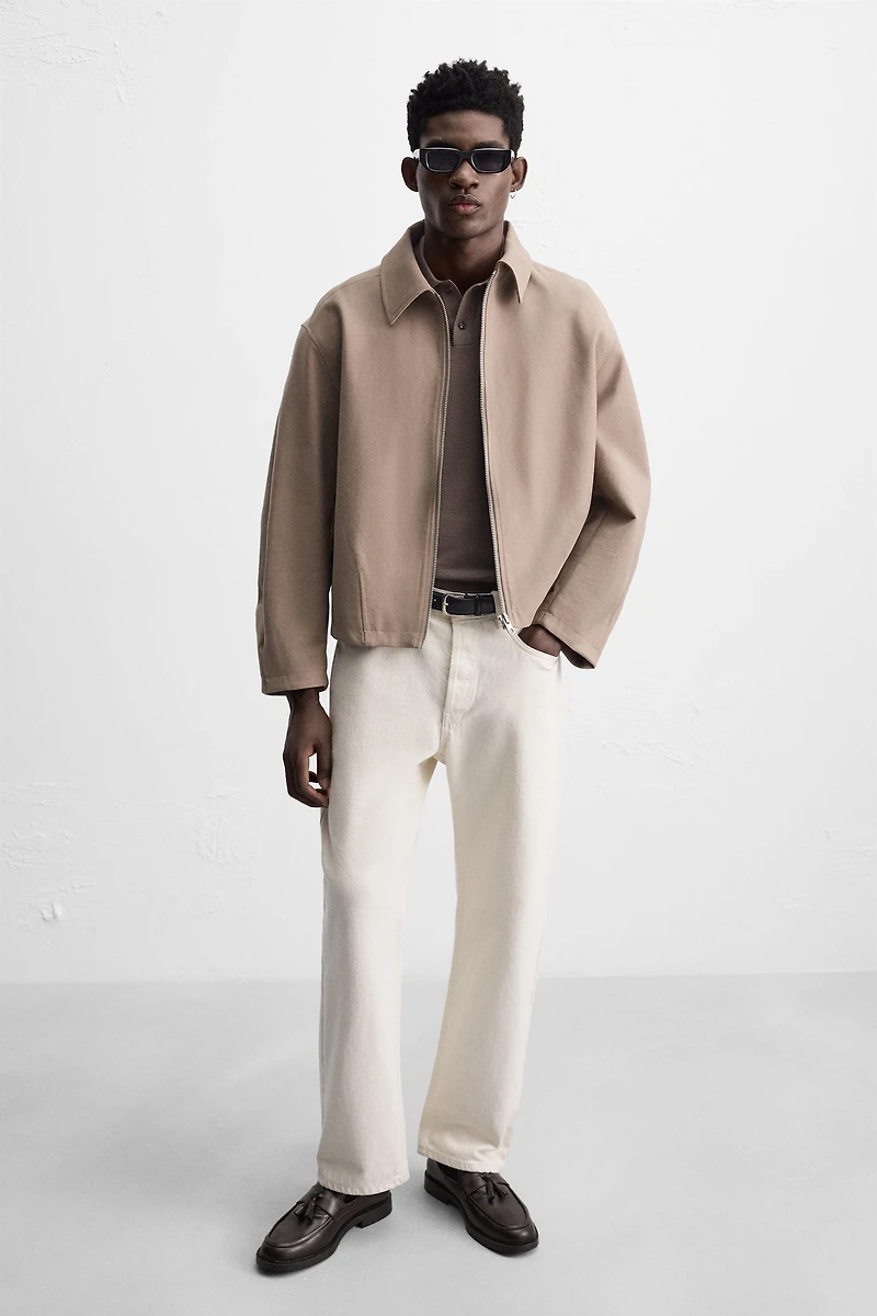 MOCASSINS CHICS À POMPONS