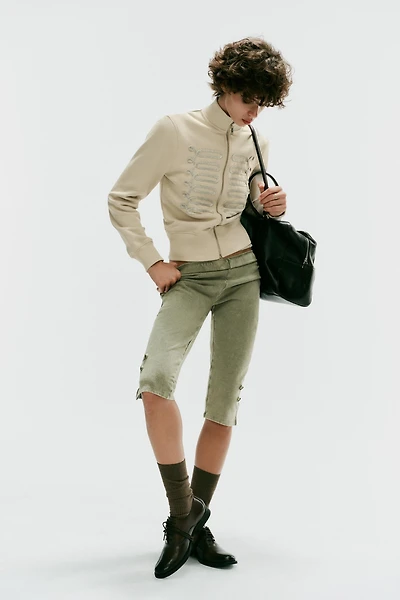 PANTALON CAPRI À PATTES DE BOUTONNAGE