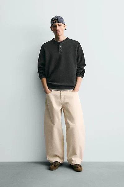 STRUCTURED HENLEY SWEATSHIRT