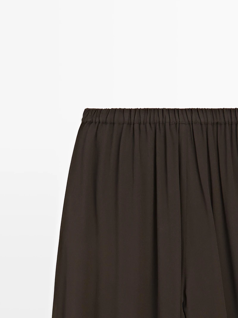 Pantalon bouffant semi-transparent avec boutons