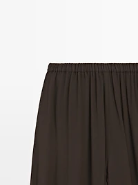 Pantalon bouffant semi-transparent avec boutons