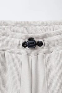 PANTALON DE JOGGING GAUFRÉ COMBINÉ