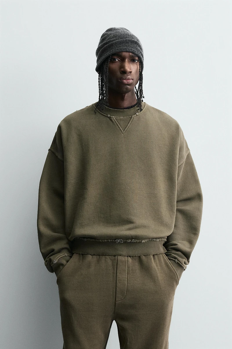 SWEAT COL ROND DÉLAVÉ